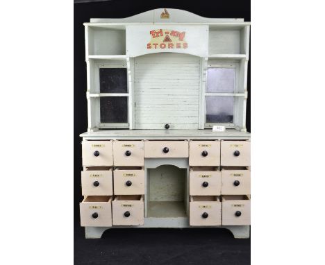 Tri-Ang wooden stores display with thirteen drawers with produce labels, shelf unit with glazing and roller shutter, W59 x D2