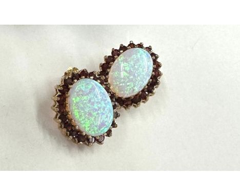 Pair of 9ct gold opal and garnet earrings total weight 3.4 grams 