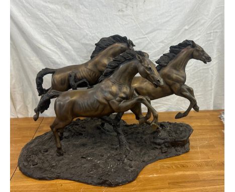 Large vintage bronzed figure of three galloping horses measures approx 30 inches wide by 20 inches tall and 21 inches deep 