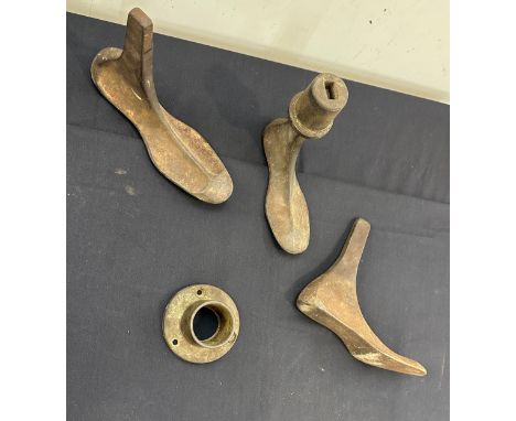 Selection of vintage cast iron shoe lasts 