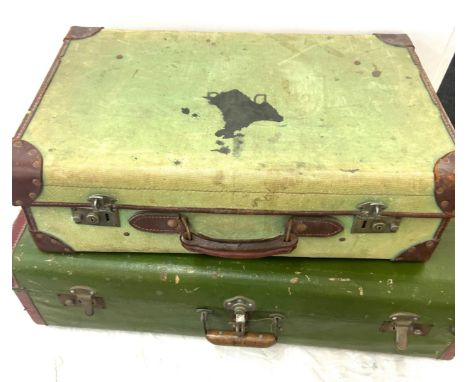 Two vintage suitcases largest measures 30 inches wide, 18 inches deep and 9.5 tall 