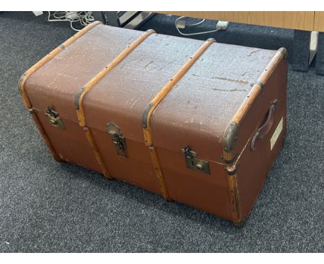 Vintage steamer trunk measures approx 36 inches wide x 20 inches tall 
