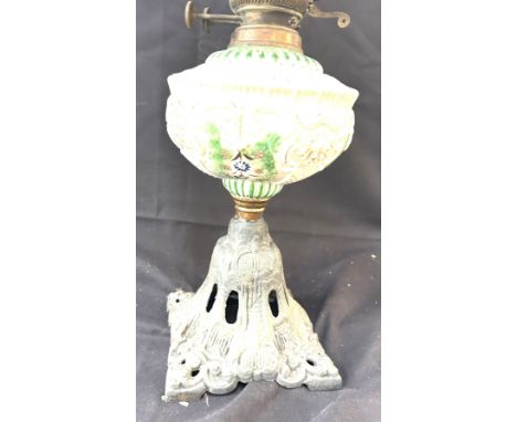 Vintage oil lamp with cast base and plastic shade overall height 24 inches 