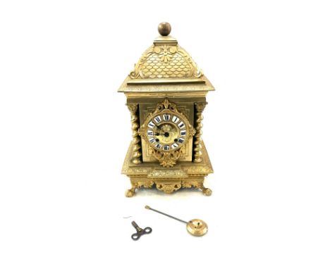 Vintage brass 2 key hole mantel clock with key and pendulum, approximate measurements Height 14 inches, Width 8 inches 
