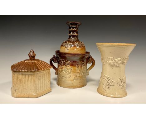A 19th century salt glazed stoneware Tobacco jar with candlestick cover, decorated with Thistles and Roses, grape vines, and 