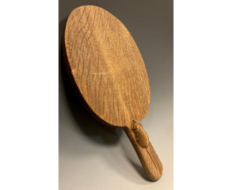 A Robert 'Mouseman' Thompson of Kilburn, English quarter sawn Oak oval Cheese Board,  with carved mouse trademark to handle, 