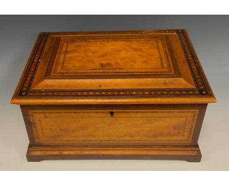 A late 19th century tulipwood crossbanded satinwood rectangular box, hinged cover, outlined throughoutt with boxwood stringin