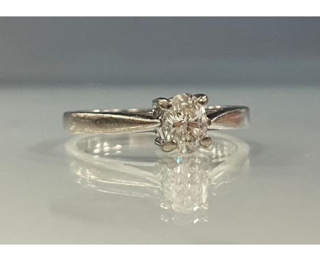A certified diamond oval mixed cut solitaire ring, 0.33ct H colour, SI2 clarity  diamond, 18ct white gold shank, size K, 3.1g