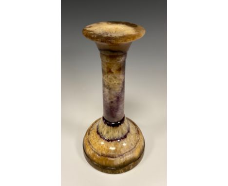 A 19th century Derbyshire Blue John fluorite candlestick, plain column, stepped circulat foot, 17.7cm high, foot 9cm diameter