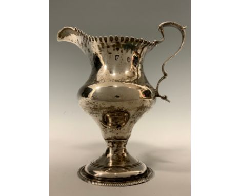 A George III silver cream jug, makers marks worn possibly J K, Chester 1780, 90.0g, 11cm high 