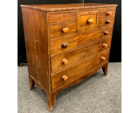 A Victorian Scottish mahogany chest, rectangular oversailing top above a bonnet drawer, four small drawers and three further 