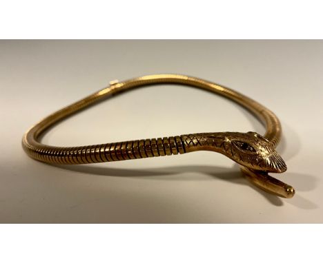 A 9ct gold articulated snake chain necklace, ruby eyes, stamped DJ 375, worn Birmingham date marks, c.1970, 40.8g gross 