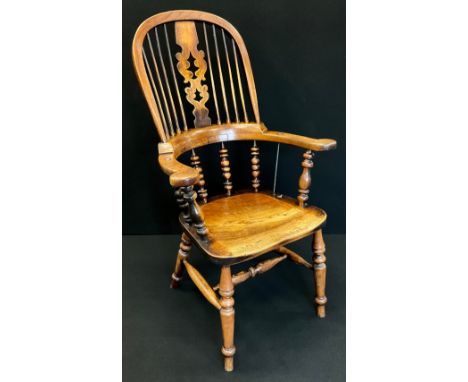 An 19th century Windsor armchair, pierced tree back splat, bobbin turned supports, turned legs, H stretcher, 110cm high, 64cm