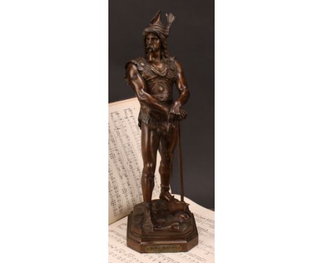 Marcel Debut (1865-1933), a brown patinated bronze, a Norse warrior, standing scantily clad in armour, resting on a  battle a