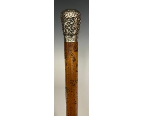 A 19th century Indian silver handled Malacca walking stick, embossed floral initialled handle, tapering shaft, 88.5cm long. 