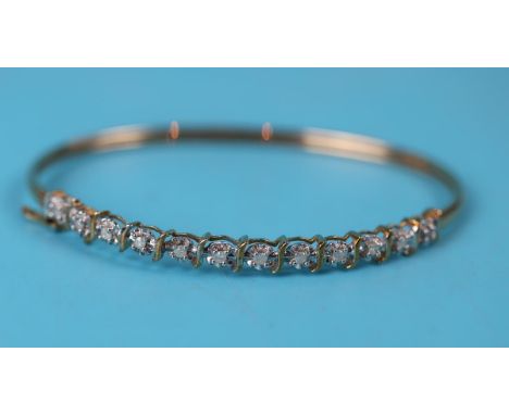 Gold diamond set bangle