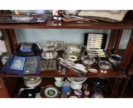 Shelf of metalware