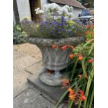 A reconstituted stone basket urn on stand, height 76cm, depth 60cm. planting removed, Condition -