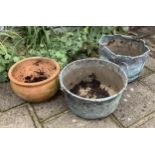 Two copper planters and one terracotta planter, planting removed, largest height 46cm. Condition -
