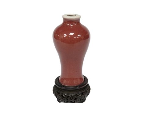 A Chinese Langyao snuff bottle, Kangxi mark, late 19th century, with hardwood stand, overall 10cm high. Condition - good, som