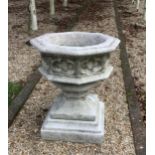 A reconstituted stone font planter, height 72cm, width 62cm. planting removed. Condition -