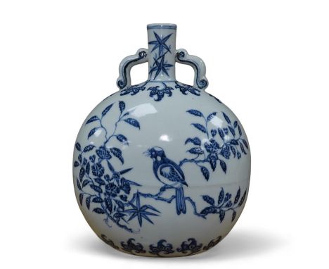 A Chinese blue and white two handled moon flask, decorated with birds on on branches, 29cm high. Condition - good