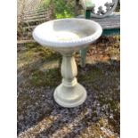 A Sparta Statues reconstituted stone pedestal bird bath, height 58cm, a more ornate larger bird