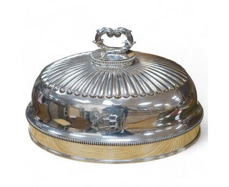 A 19th century Old Sheffield plate oval meat dish cover, with handle, 32.5cm long. Condition - good