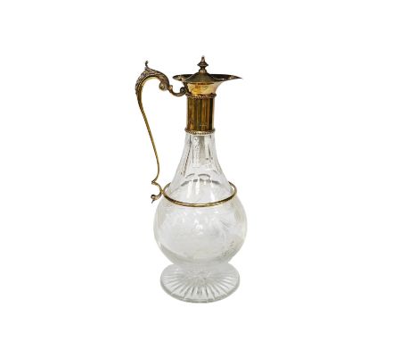 A modern silver gilt mounted cut glass pyriform claret jug, maker JM, Sheffield, 2001, 31.2cm.  Condition - good