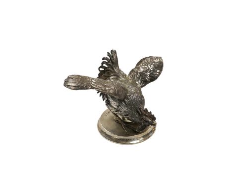 An Elizabeth II silver presentation cockerel, on a circular base with engraved inscription, by Garrard &amp; Co Ltd, London, 