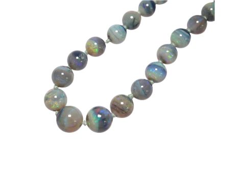 A single strand graduated blue opal bead necklace, with 9ct clasp, retailed by Liberty &amp; Co?, 44cm, with Liberty &amp; Co