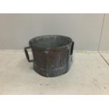 A 19th century French copper walnut measure, diameter 45cm, height 26cm. Condition - weathered