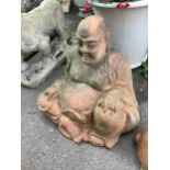 A terracotta model of a seated Buddha, height 55cm, and a model of a rabbit garden ornament,