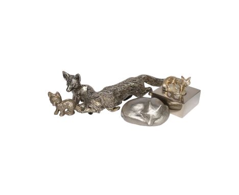 A collection of silver plated, pewter and white metal models of foxes, glass paperweight, button hooks, etc. Condition - most