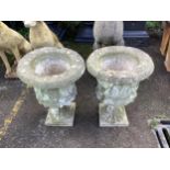 A pair of reconstituted stone garden urns, height 55cm and three assorted marble urns. Condition -