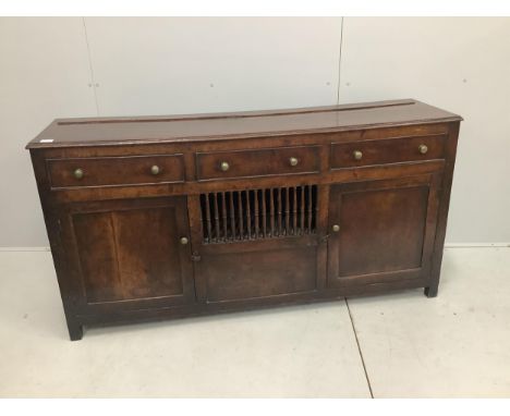 An 18th century North Wales oak enclosed dresser with central spindled glass or food compartment, width 163cm, depth 43cm, he
