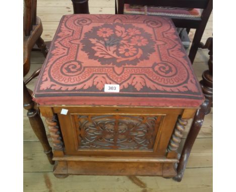 A Victorian walnut locker stool with upholstered lift-top and tray fitted interior, all round fretwork panels and barley twis