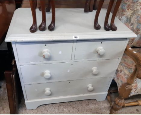 A 33" Victorian later painted pine chest of two short and two long graduated drawers, set on bracket feet - slight damage to 