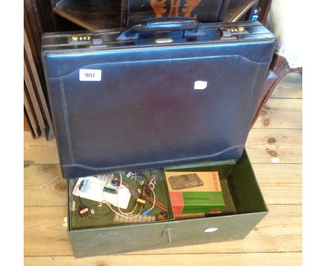 A Satchi leather combination briefcase - sold with a green metal tool box containing a small quantity of car switches, etc.