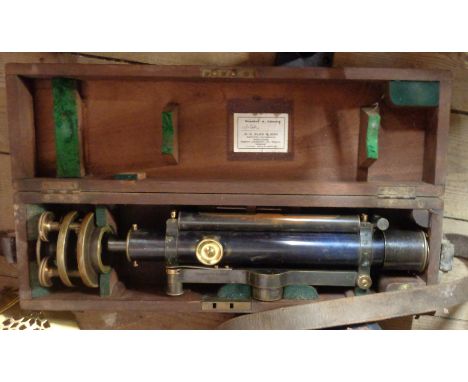 A vintage Troughton &amp; Sims Theodolite in original wooden case, brass mounted wooden tripod and Stanley measure - various 