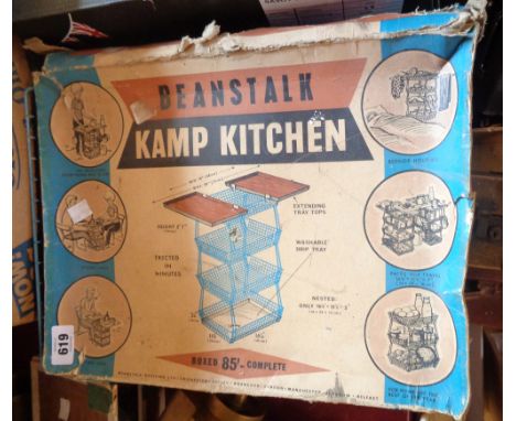 A vintage Beanstalk Kamp Kitchen collapsible storage unit in remains of original box