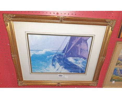 John Chancellor: a gilt framed coloured print depicting a sailing vessel on stormy seas - faded