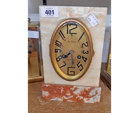 An Art Deco white and red marble cased mantel clock with oval dial marked Le Moan, Douarnenez with French eight day striking 