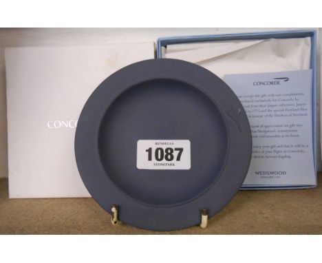 A boxed Wedgwood dark blue jasper Concorde ashtray