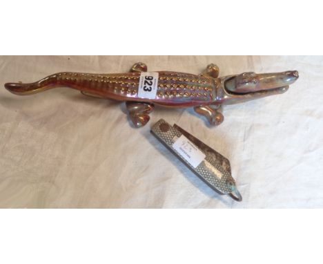 A cast iron and enamel nutcracker modelled as a crocodile - sold with a large British military jack knife
