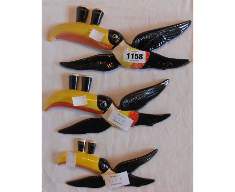 A graduated set of reproduction Carltonware style Guinness toucans