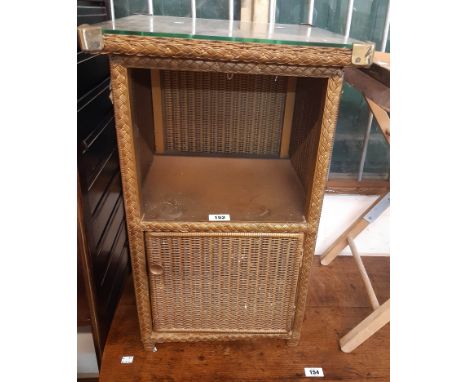 A 16" vintage Lloyd Loom bedside table with glass top, open shelf and cupboard under - original gold sprayed finish