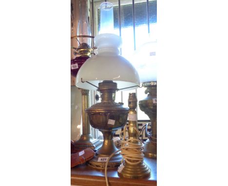 An Aladdin table oil lamp - sold with a brass table lamp and a leather wallet