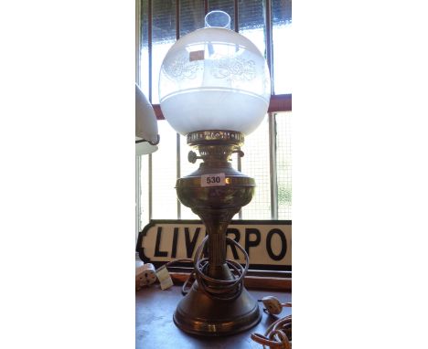 A table oil lamp with chimney and globe - converted to electricity