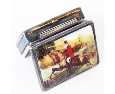 A marked 925 white metal pill box with enamelled hunting scene to hinged lid
